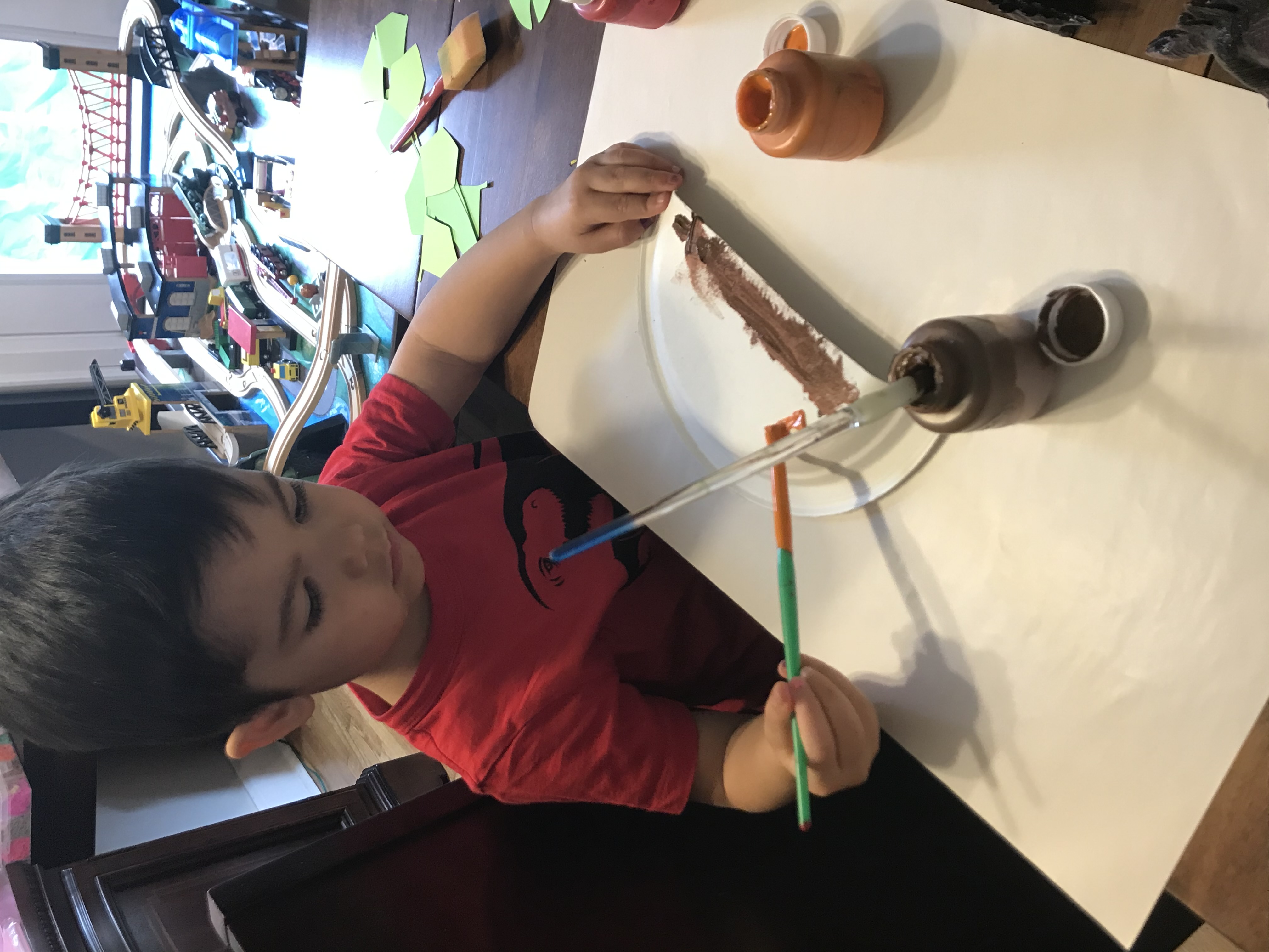 Small hands working on a craft project